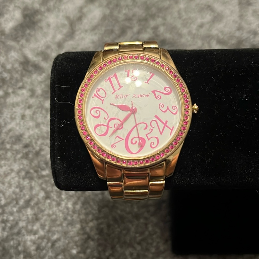 Preowned Betsey Johnson Gold Watch with Pink Crystals.